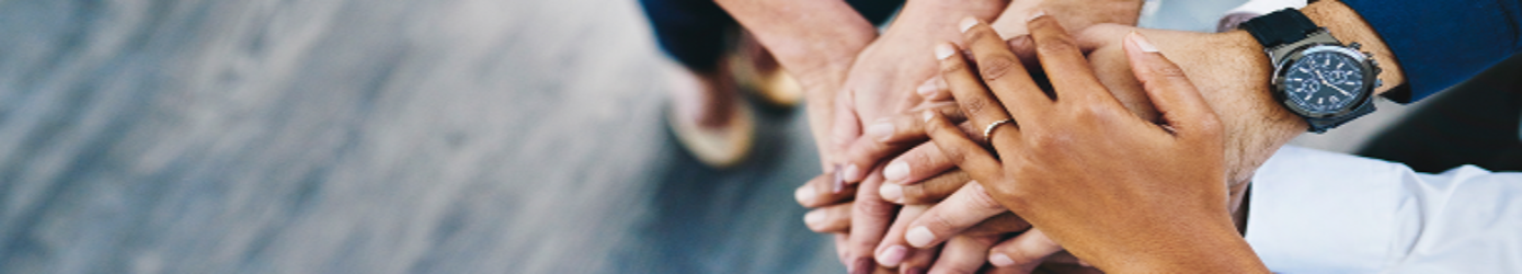 Group with hands in the middle